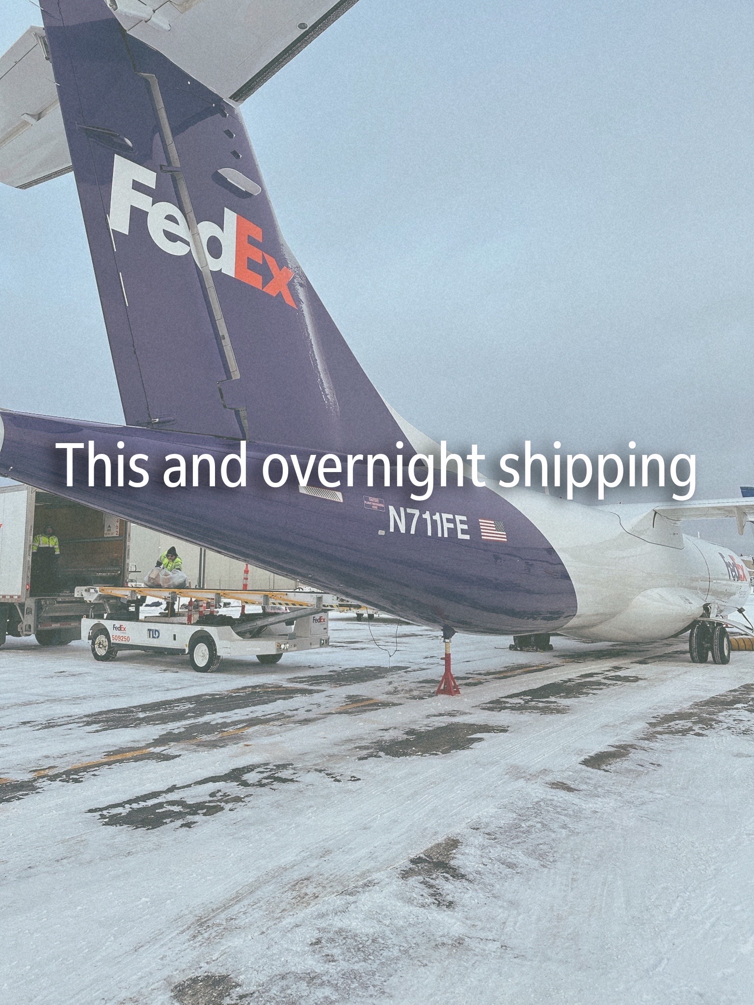 FedEx aircraft on a snowy runway