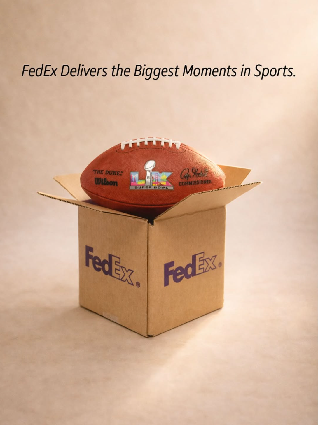 FedEx box holding the Super Bowl LX football with the line FedEx Delivers the Biggest Moments in Sports